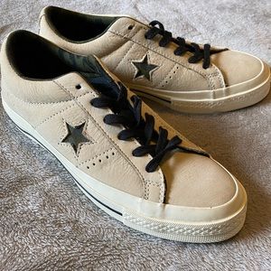Camo and Cream colored Converse